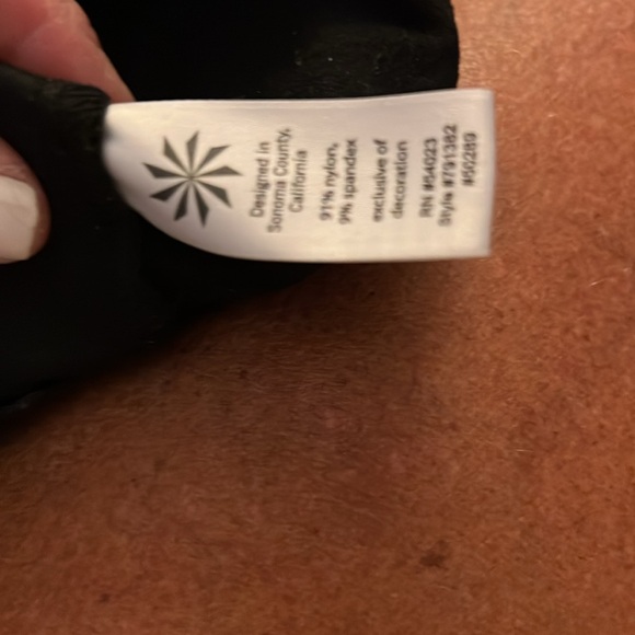 Worn once Athletica 91% nylon 9% spandex, black dress pants - Picture 7 of 7